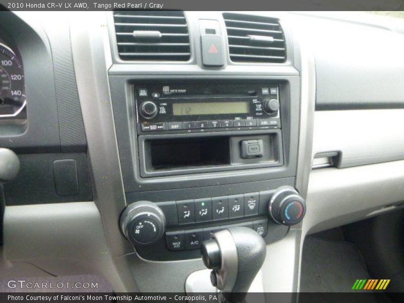 Tango Red Pearl / Gray 2010 Honda CR-V LX AWD