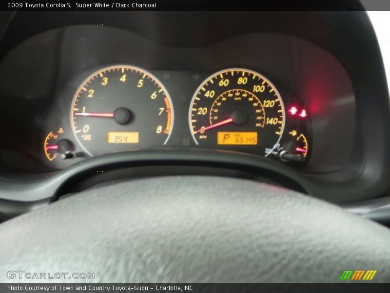 Super White / Dark Charcoal 2009 Toyota Corolla S