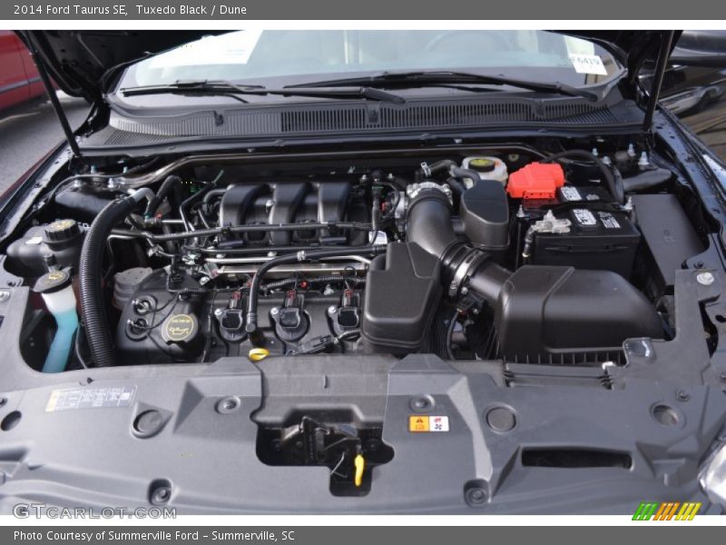 Tuxedo Black / Dune 2014 Ford Taurus SE