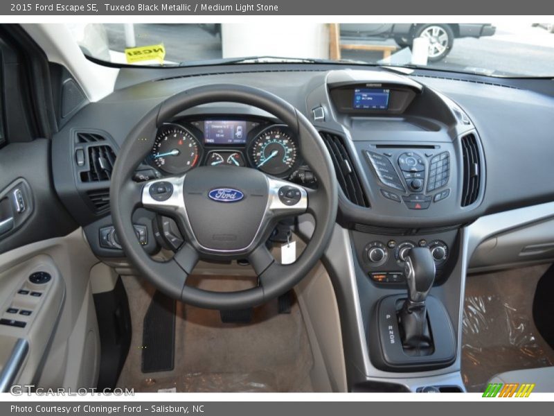 Tuxedo Black Metallic / Medium Light Stone 2015 Ford Escape SE