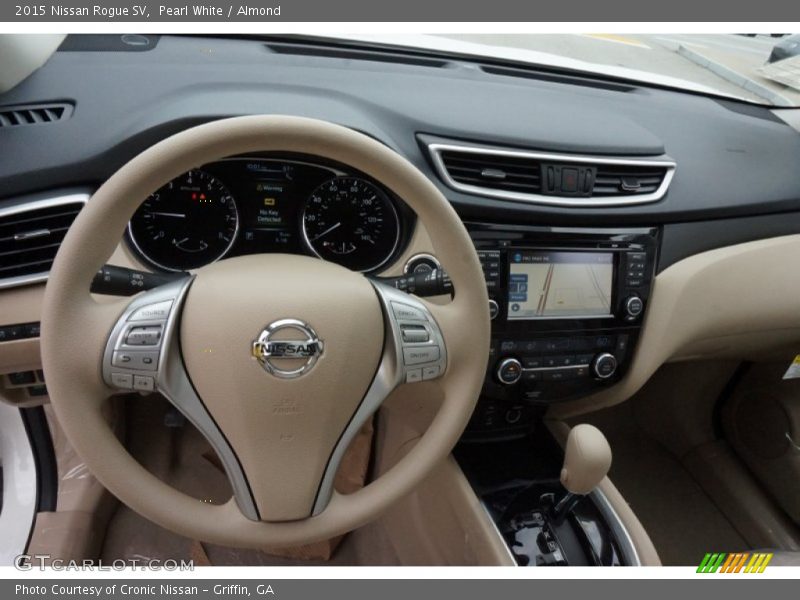 Pearl White / Almond 2015 Nissan Rogue SV