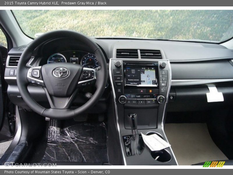 Dashboard of 2015 Camry Hybrid XLE