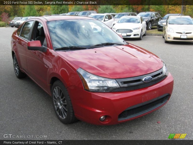 Sangria Red Metallic / Charcoal Black 2010 Ford Focus SES Sedan