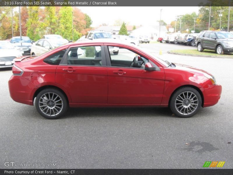 Sangria Red Metallic / Charcoal Black 2010 Ford Focus SES Sedan