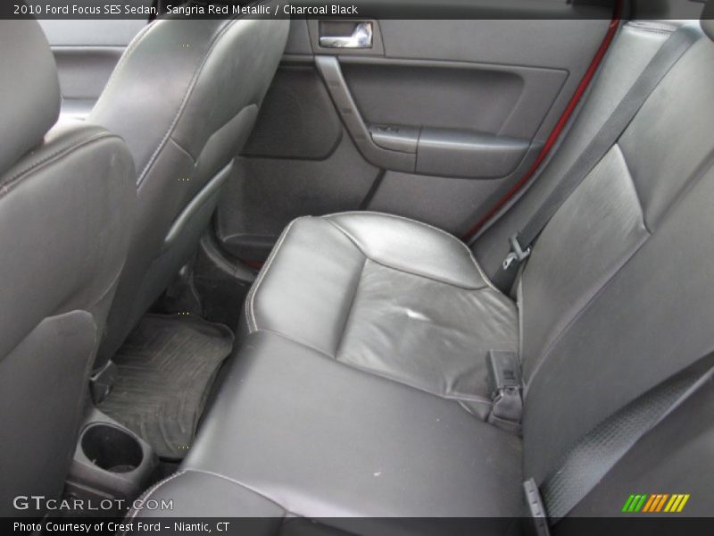 Sangria Red Metallic / Charcoal Black 2010 Ford Focus SES Sedan