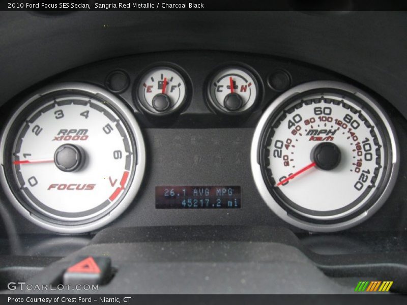 Sangria Red Metallic / Charcoal Black 2010 Ford Focus SES Sedan