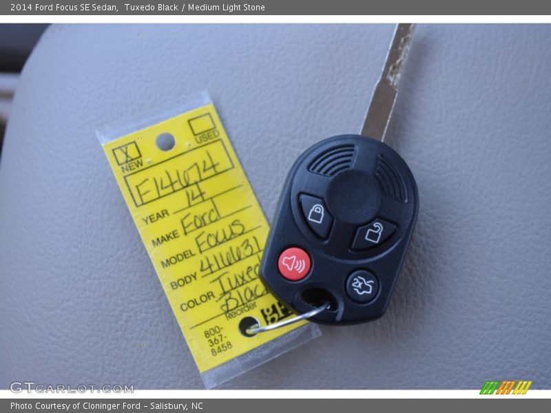 Tuxedo Black / Medium Light Stone 2014 Ford Focus SE Sedan