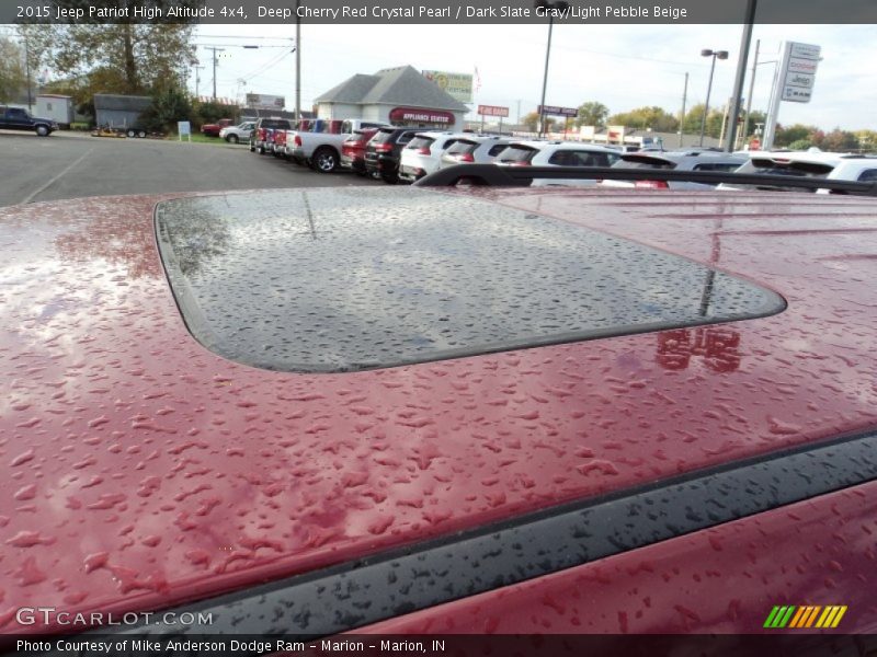 Deep Cherry Red Crystal Pearl / Dark Slate Gray/Light Pebble Beige 2015 Jeep Patriot High Altitude 4x4