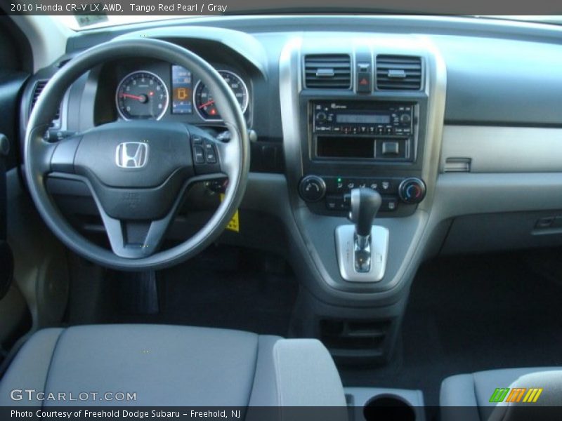 Tango Red Pearl / Gray 2010 Honda CR-V LX AWD
