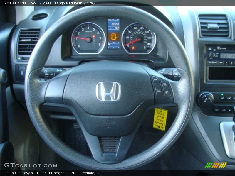 Tango Red Pearl / Gray 2010 Honda CR-V LX AWD
