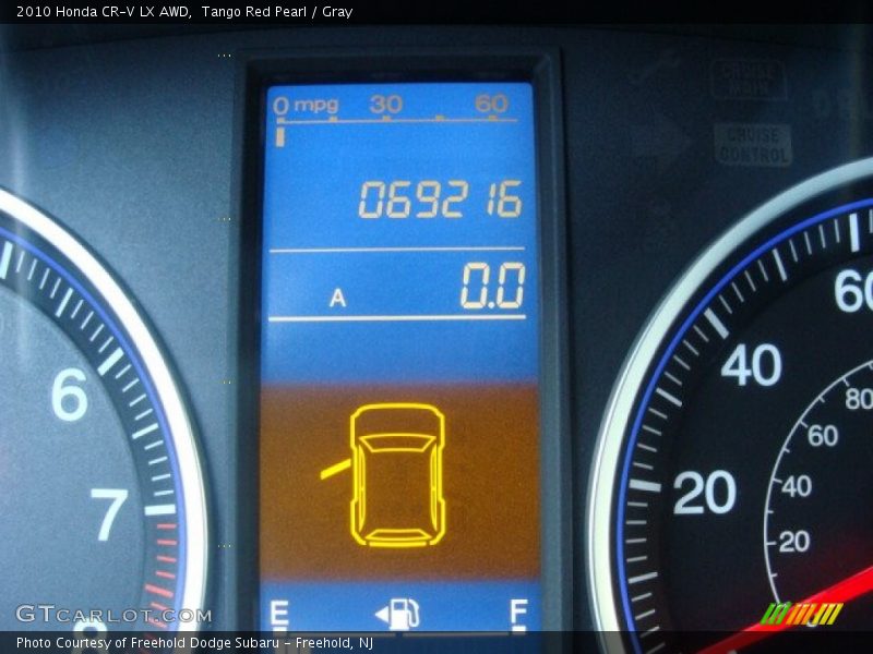 Tango Red Pearl / Gray 2010 Honda CR-V LX AWD