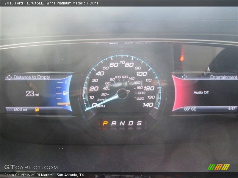 White Platinum Metallic / Dune 2015 Ford Taurus SEL