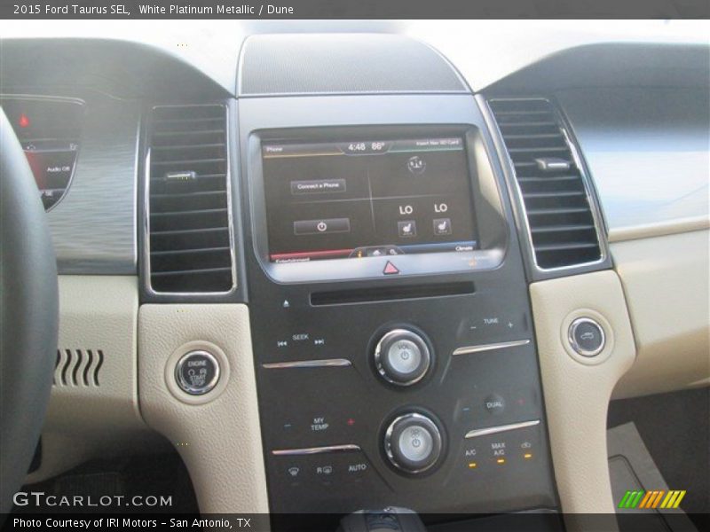 White Platinum Metallic / Dune 2015 Ford Taurus SEL