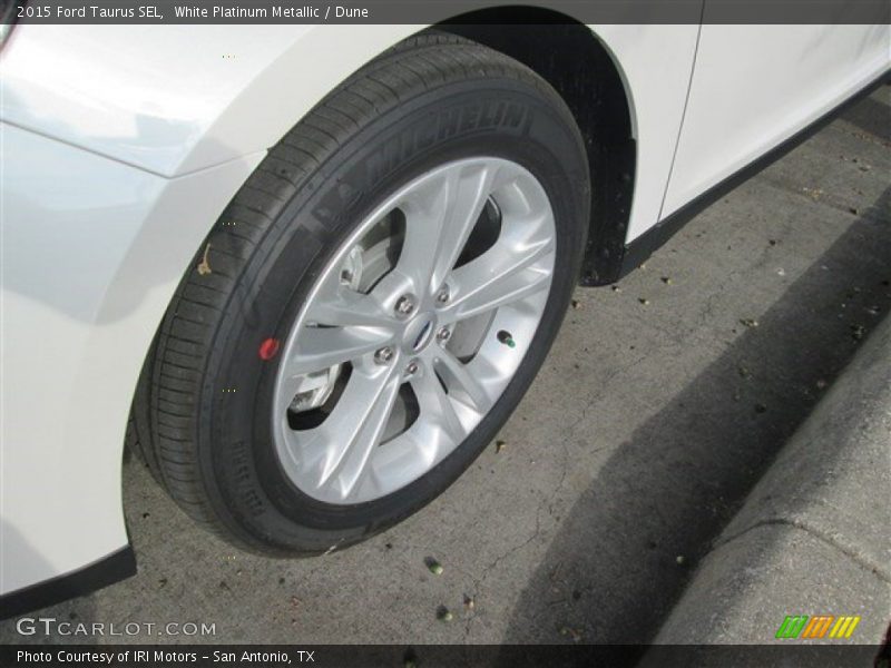 White Platinum Metallic / Dune 2015 Ford Taurus SEL