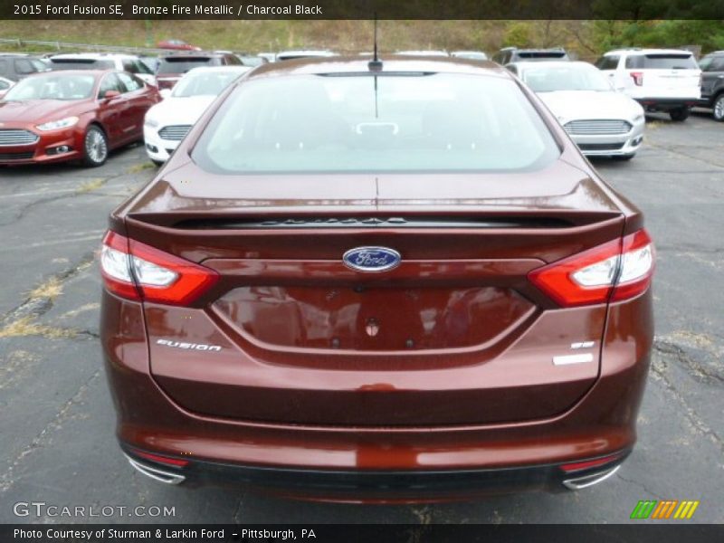 Bronze Fire Metallic / Charcoal Black 2015 Ford Fusion SE
