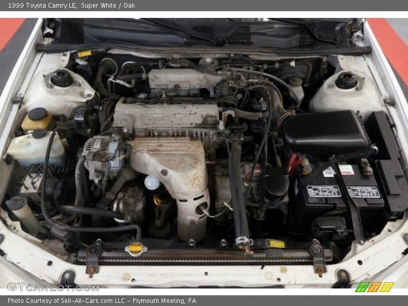 Super White / Oak 1999 Toyota Camry LE