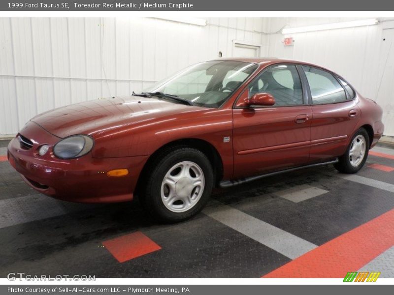 Toreador Red Metallic / Medium Graphite 1999 Ford Taurus SE