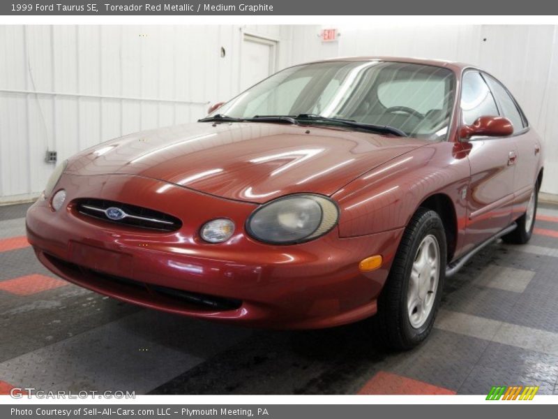 Toreador Red Metallic / Medium Graphite 1999 Ford Taurus SE