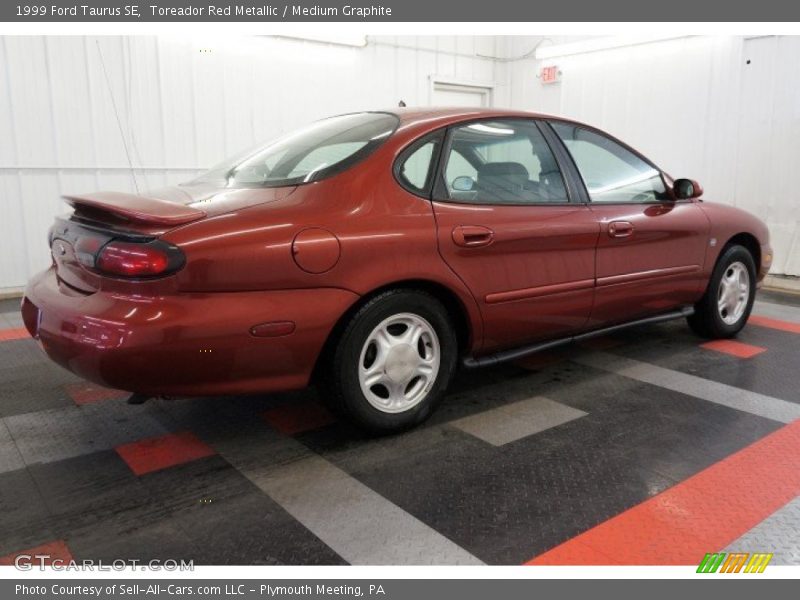 Toreador Red Metallic / Medium Graphite 1999 Ford Taurus SE