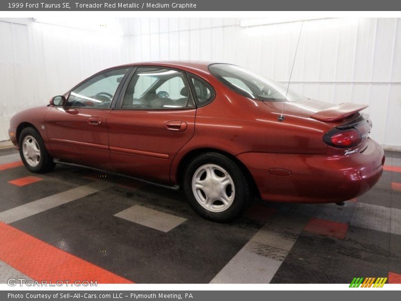 Toreador Red Metallic / Medium Graphite 1999 Ford Taurus SE