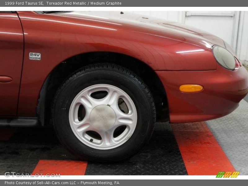 Toreador Red Metallic / Medium Graphite 1999 Ford Taurus SE