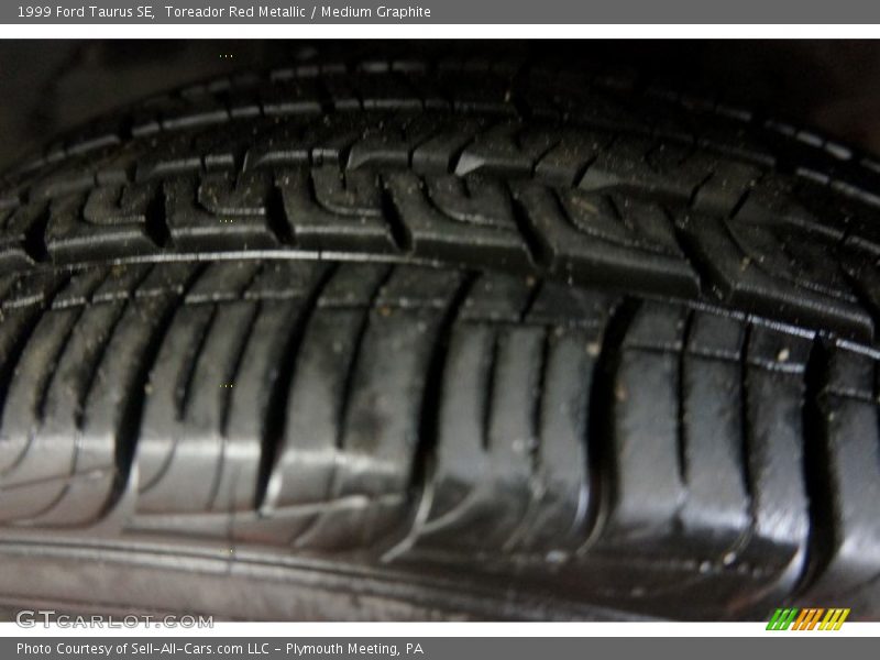 Toreador Red Metallic / Medium Graphite 1999 Ford Taurus SE