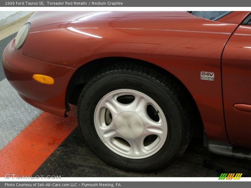 Toreador Red Metallic / Medium Graphite 1999 Ford Taurus SE