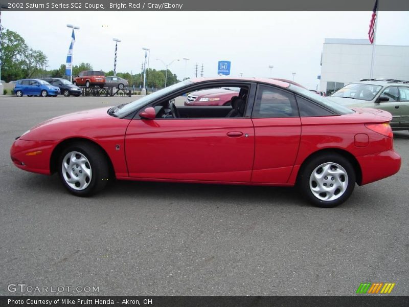 Bright Red / Gray/Ebony 2002 Saturn S Series SC2 Coupe