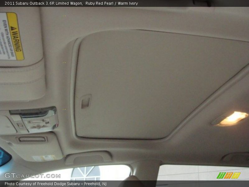 Ruby Red Pearl / Warm Ivory 2011 Subaru Outback 3.6R Limited Wagon