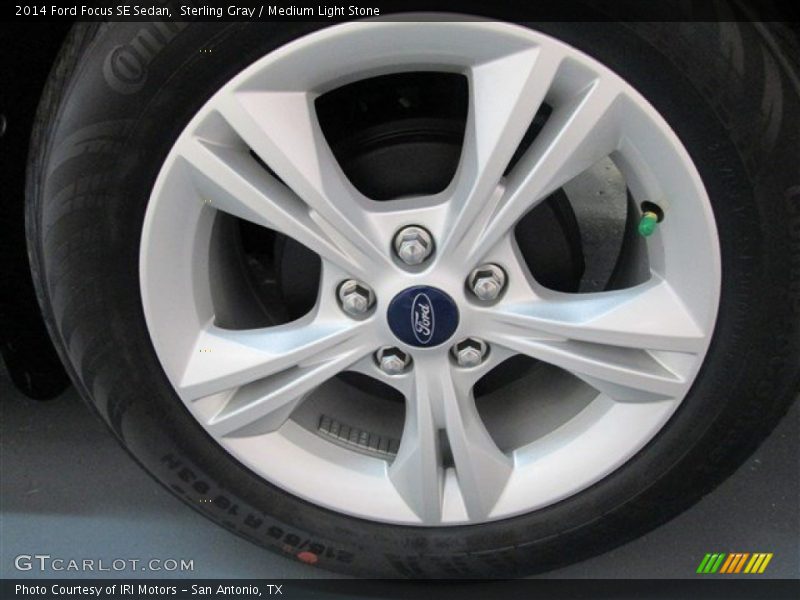 Sterling Gray / Medium Light Stone 2014 Ford Focus SE Sedan