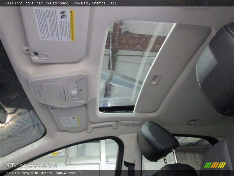 Ruby Red / Charcoal Black 2014 Ford Focus Titanium Hatchback