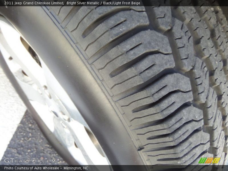 Bright Silver Metallic / Black/Light Frost Beige 2011 Jeep Grand Cherokee Limited