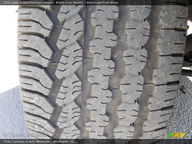 Bright Silver Metallic / Black/Light Frost Beige 2011 Jeep Grand Cherokee Limited