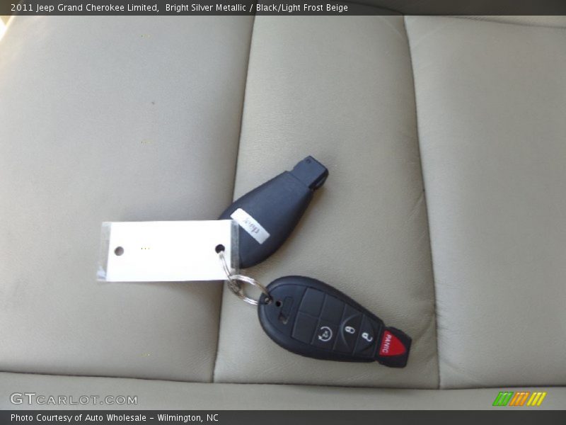 Bright Silver Metallic / Black/Light Frost Beige 2011 Jeep Grand Cherokee Limited