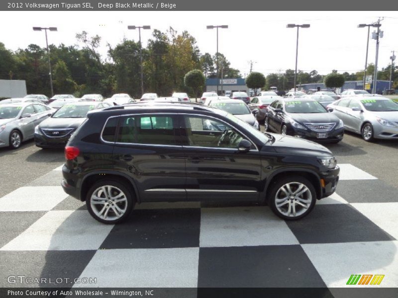 Deep Black Metallic / Beige 2012 Volkswagen Tiguan SEL