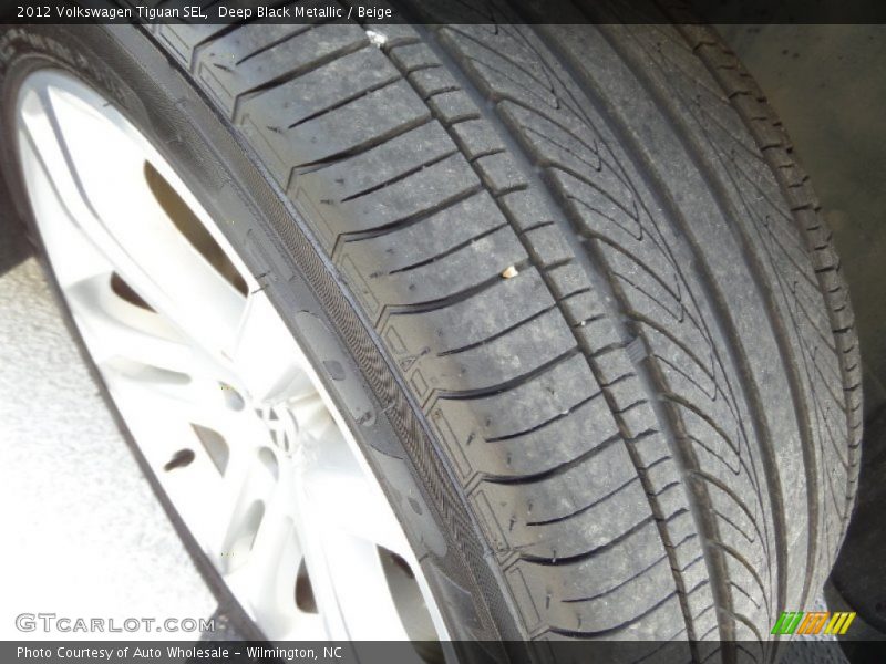 Deep Black Metallic / Beige 2012 Volkswagen Tiguan SEL