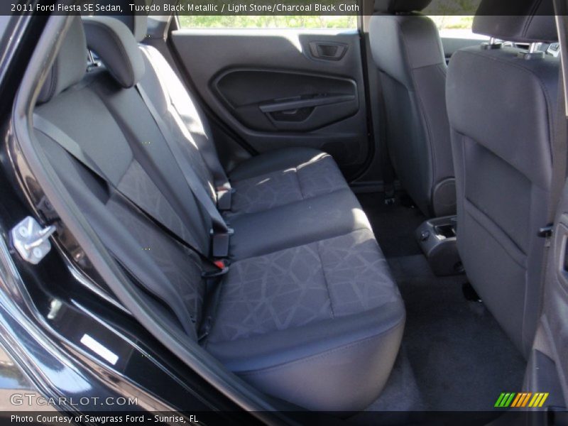 Tuxedo Black Metallic / Light Stone/Charcoal Black Cloth 2011 Ford Fiesta SE Sedan