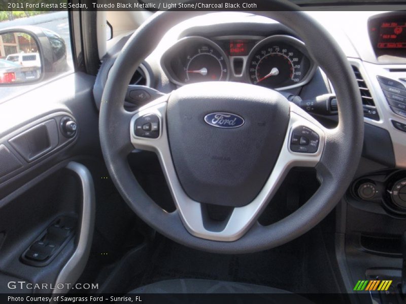 Tuxedo Black Metallic / Light Stone/Charcoal Black Cloth 2011 Ford Fiesta SE Sedan
