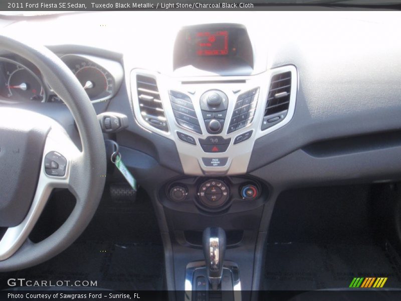 Tuxedo Black Metallic / Light Stone/Charcoal Black Cloth 2011 Ford Fiesta SE Sedan