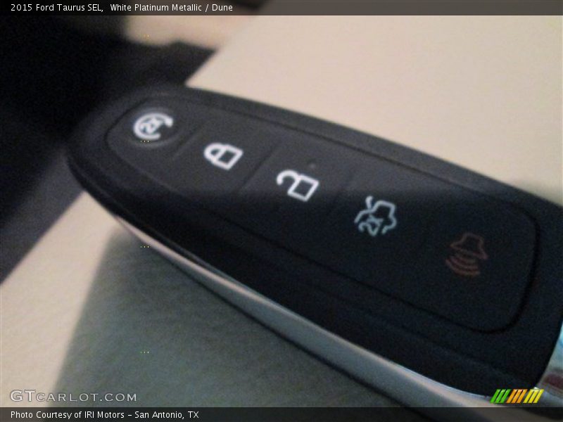 White Platinum Metallic / Dune 2015 Ford Taurus SEL