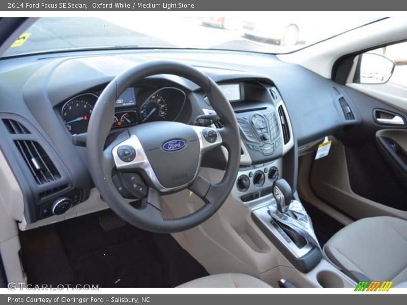 Oxford White / Medium Light Stone 2014 Ford Focus SE Sedan