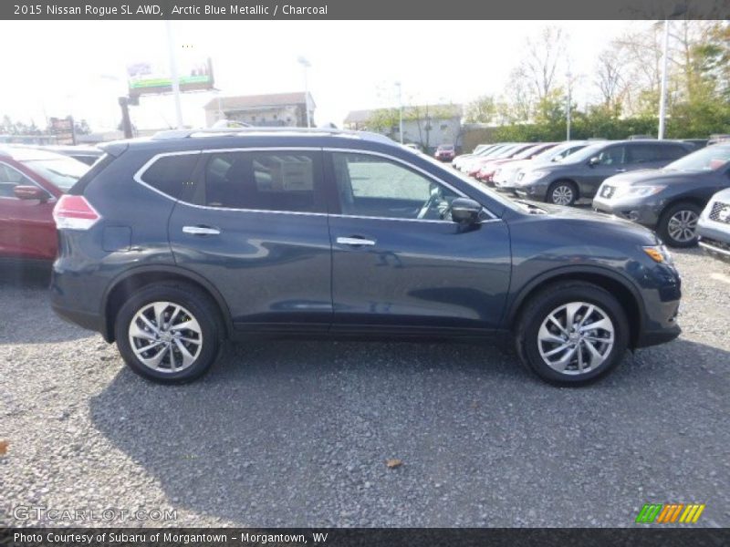 Arctic Blue Metallic / Charcoal 2015 Nissan Rogue SL AWD