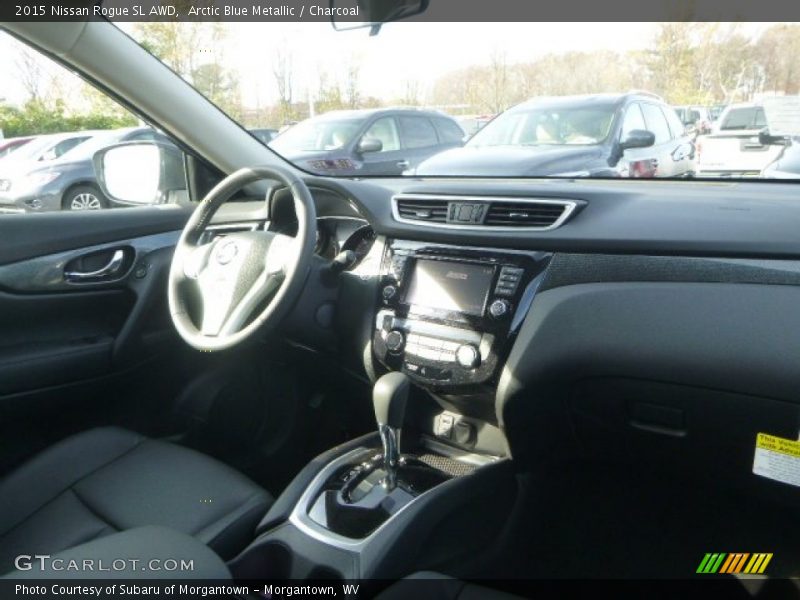 Arctic Blue Metallic / Charcoal 2015 Nissan Rogue SL AWD