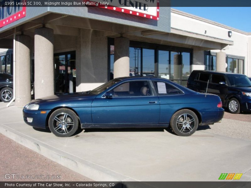 Midnight Indigo Blue Metallic / Ivory 1995 Lexus SC 300