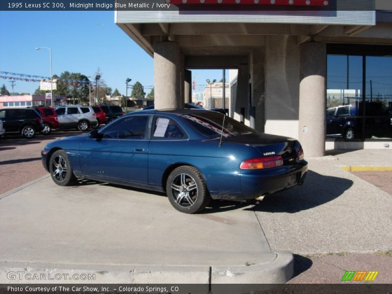 Midnight Indigo Blue Metallic / Ivory 1995 Lexus SC 300