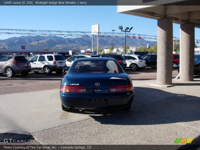 Midnight Indigo Blue Metallic / Ivory 1995 Lexus SC 300