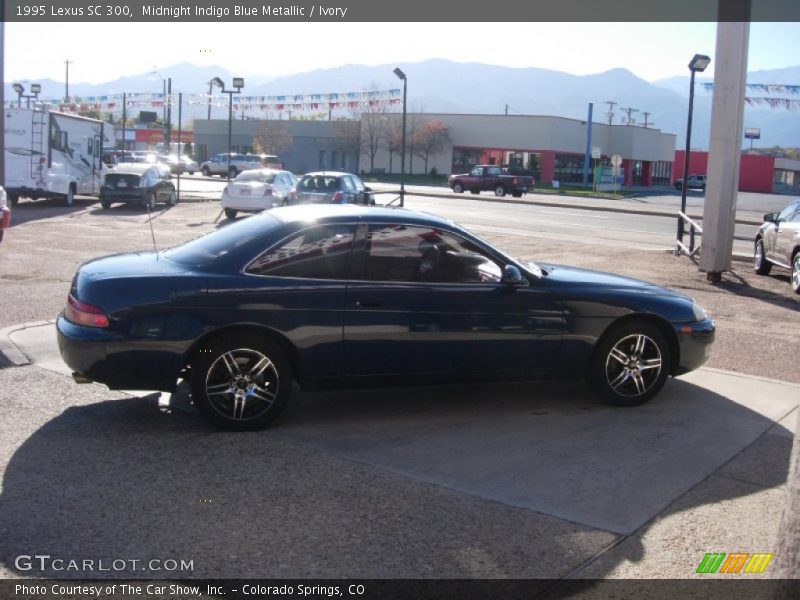 Midnight Indigo Blue Metallic / Ivory 1995 Lexus SC 300