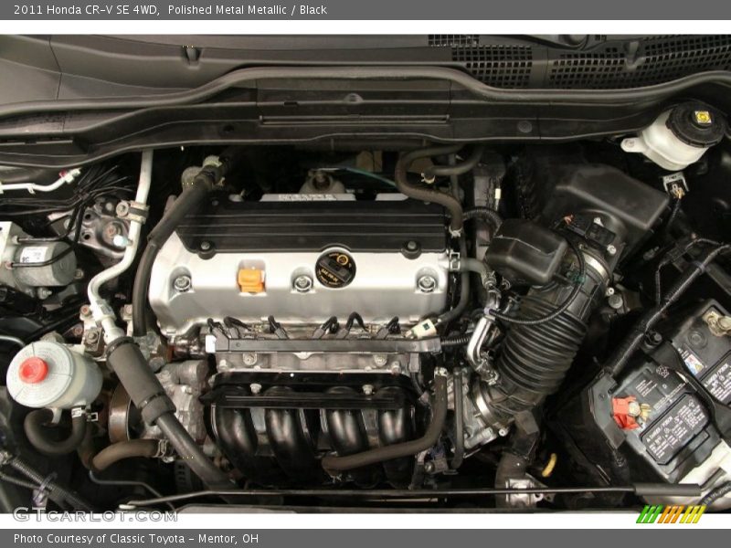 Polished Metal Metallic / Black 2011 Honda CR-V SE 4WD