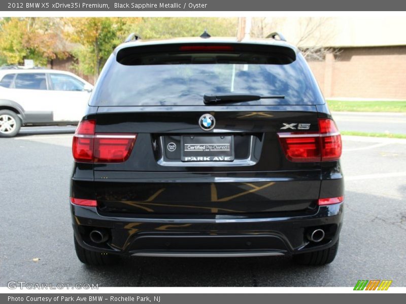 Black Sapphire Metallic / Oyster 2012 BMW X5 xDrive35i Premium