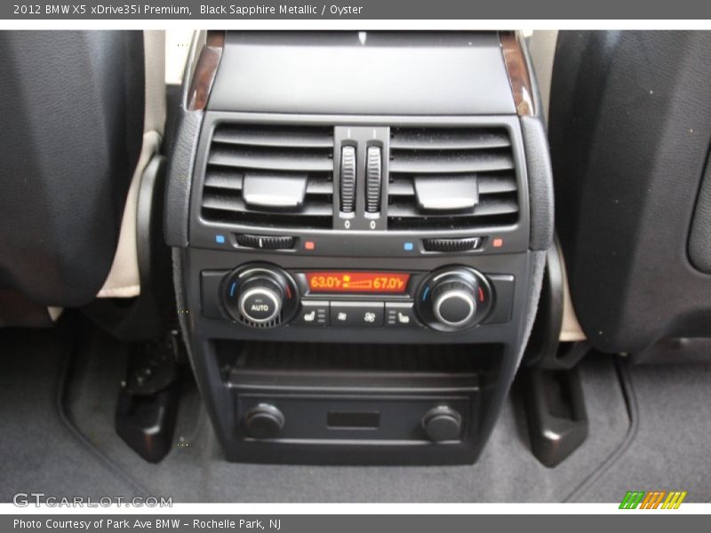 Black Sapphire Metallic / Oyster 2012 BMW X5 xDrive35i Premium